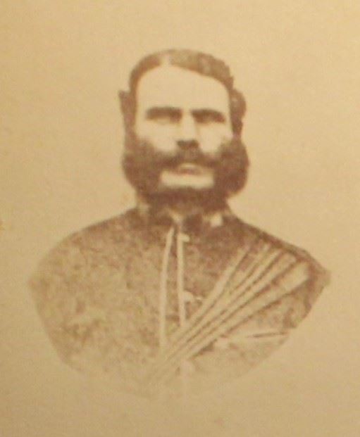 portrait photo of a man with moustache and whiskers